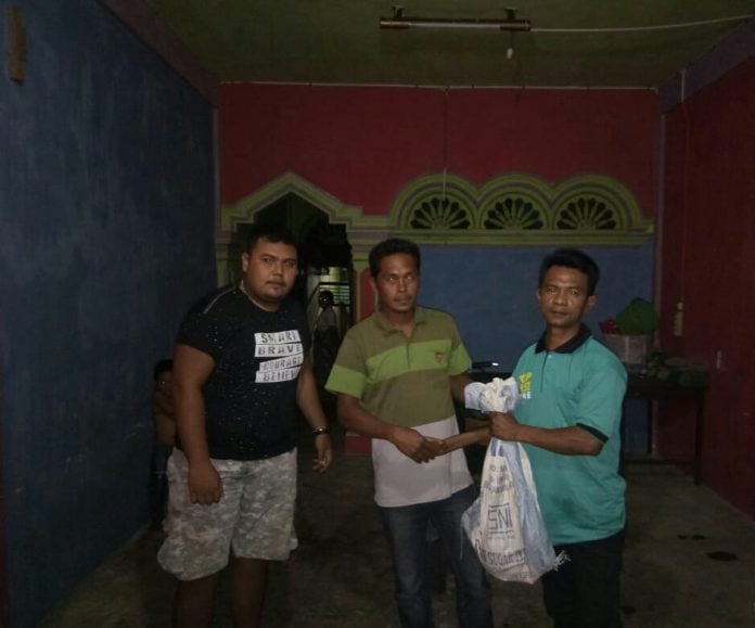 545c7854-a36b-4225-90df-9cbe1c24d7a3 Serah Terima Trenggiling dari Warga Gampong Lhok Aman ke Petugas TN. Gunung Leuser (03/01/2019) Doc : Eva W