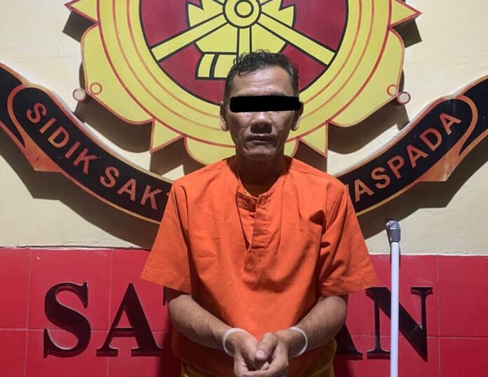 pelaku saat ditahan. Foto : Polresta Banda Aceh.